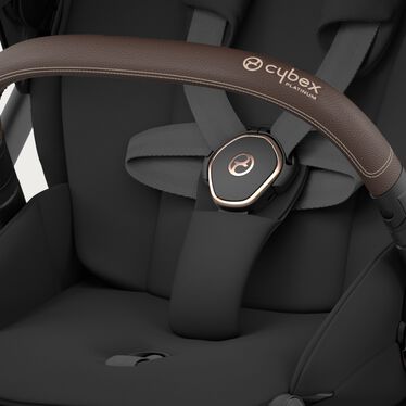 An image of the CYBEX Platinum Mios Seat Pack Stroller, highlighting the One-pull Harness feature.