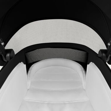 An image of the CYBEX Platinum Mios/Coya Fold Lux Carry Cot - Style Collection Stroller, highlighting the Breathable Soft Foam Mattress feature.