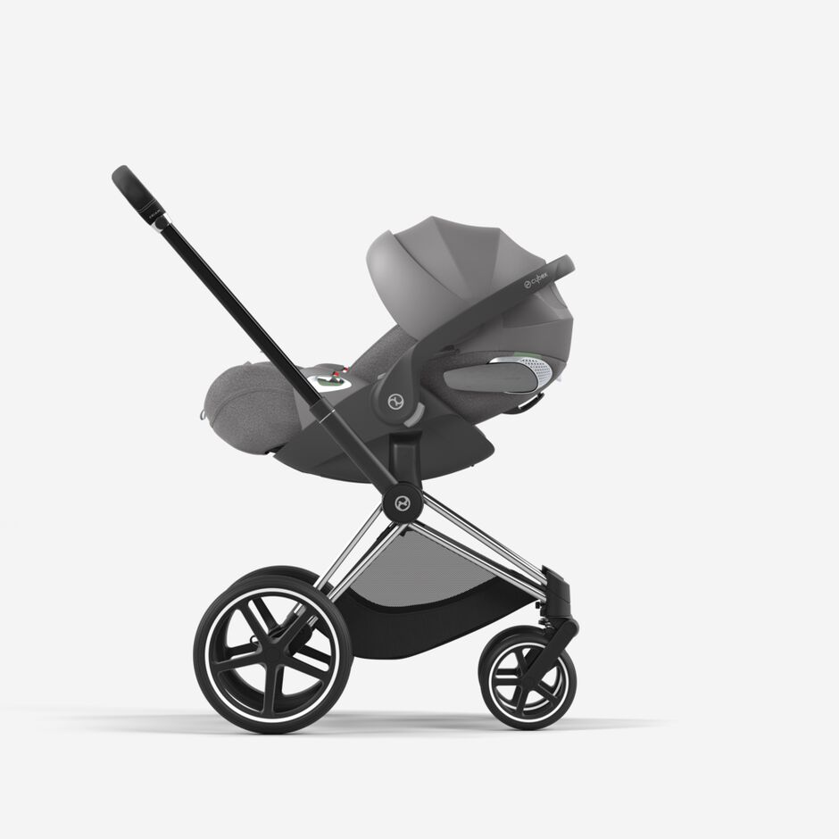 An image of the CYBEX Platinum Cloud T i-Size Infant Car Seat, highlighting the Easy transition from car to pushchair feature.