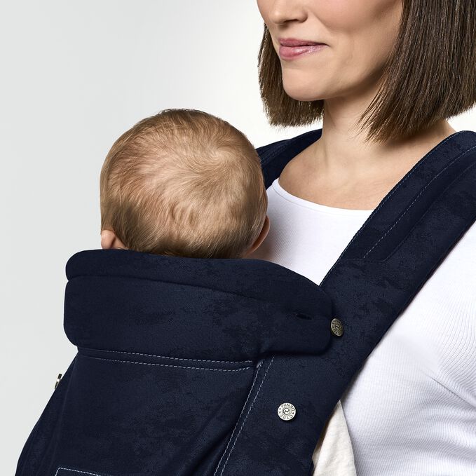 An image of the CYBEX Platinum Coya Carrier Rebellious Luxury Baby Carrier, highlighting the Optimal Neck Support feature.