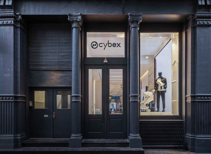 CYBEX Flagship Store New York with a mannequin and a Coya Urban Mobility lightweight stroller in the window.