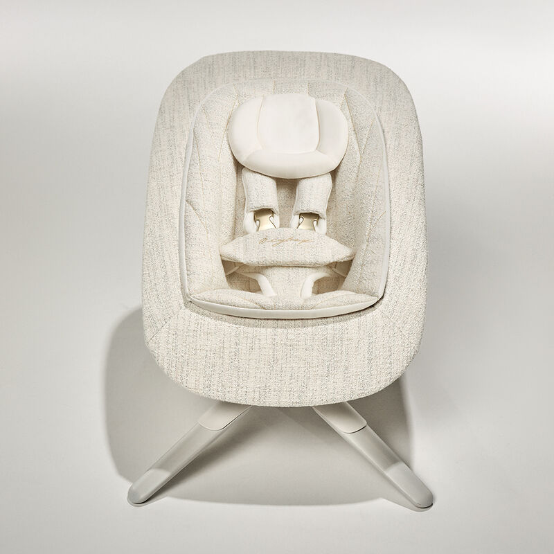 Lemo Platinum baby bouncer in cream colour, viewed from above.