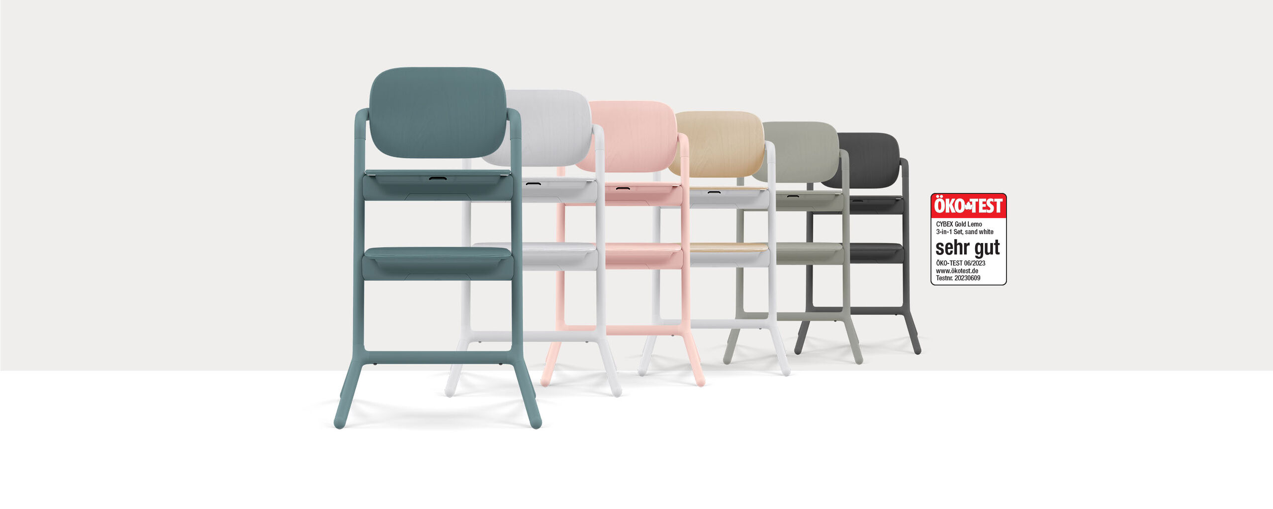 A set of six modern high chairs in various colours, including blue, white, pink, beige, grey, and black. On the right is an Eco-Test seal with the rating "very good."