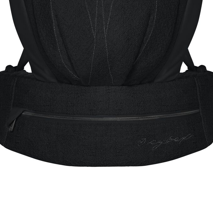 An image of the CYBEX Platinum Coya Carrier Bouclé Baby Carrier, highlighting the Zip Pocket feature.