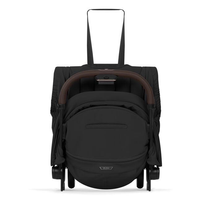 Afbeelding van de CYBEX Platinum Coya - Style Collection Buggy, met de nadruk op de functie Integrated Carry Strap.