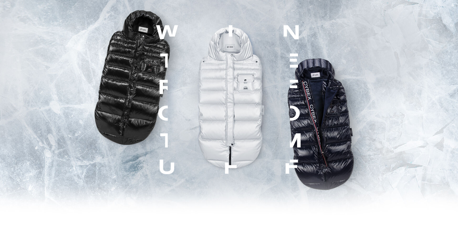 Three quilted sleeping bags in black, white, and dark blue on an icy background.