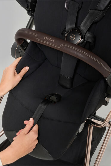 Product image of a woman pulling on the one pull harness of the Seat Unit.