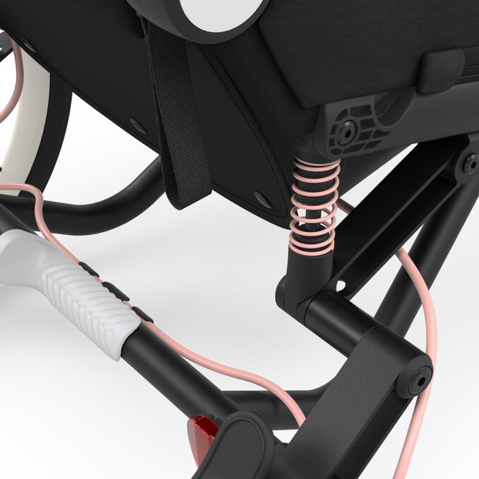 An image of the CYBEX Gold Zeno Frame Cross Country Ski Trailer, highlighting the Ride In Comfort feature.