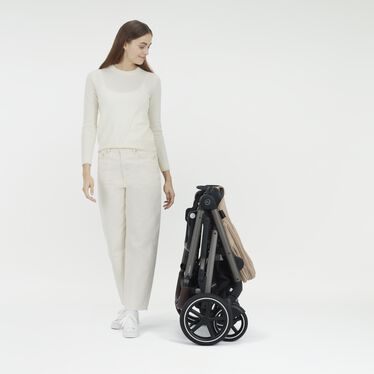 An image of the CYBEX Gold Gazelle S Sibling Stroller, highlighting the Compact Fold feature.