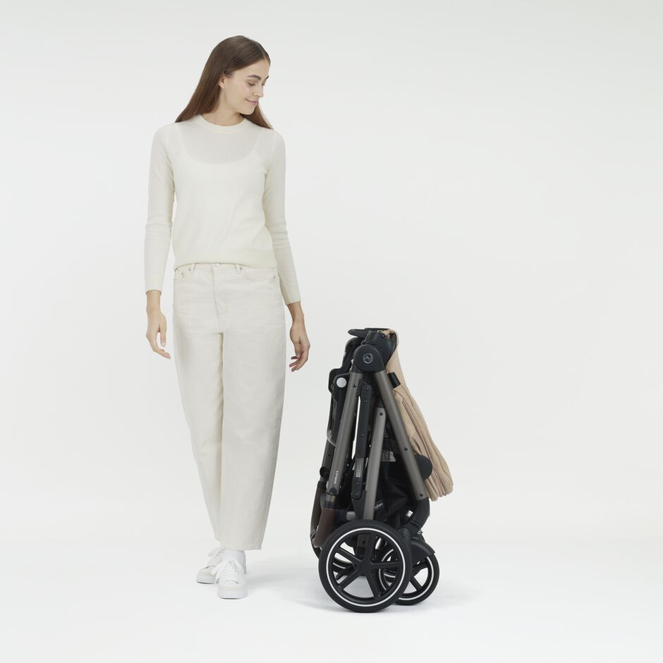 An image of the CYBEX Gold Gazelle S Sibling Stroller, highlighting the Compact Fold feature.