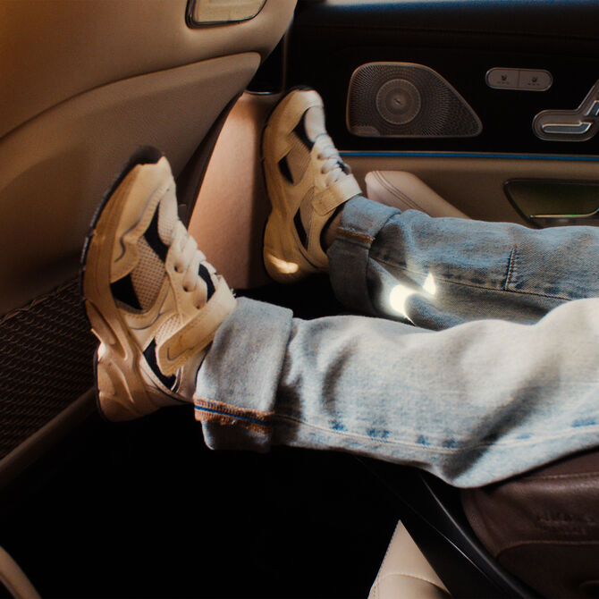 An image of legs with shoes to show legroom.