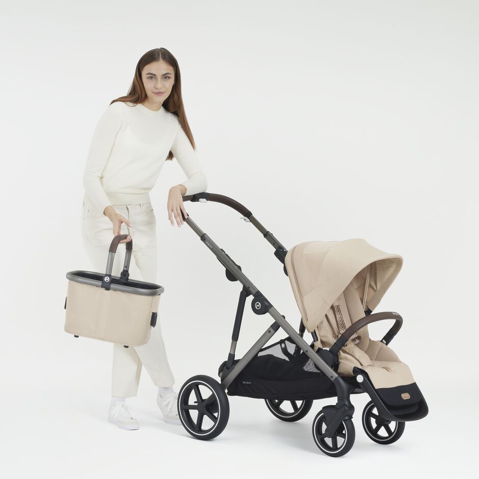 An image of the CYBEX Gold Gazelle S Sibling Stroller, highlighting the Free Basket Included feature.