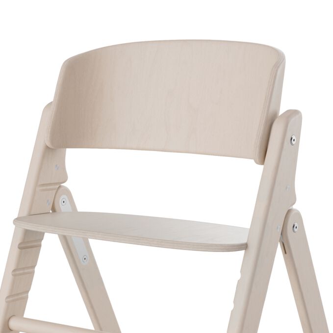 An image of the CYBEX Gold Click & Fold 3-in-1 Highchair, highlighting the Curved for Comfort feature.