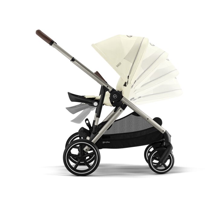 An image of the CYBEX Gold Gazelle S Sibling Stroller, highlighting the Ergonomic Lie-Flat Position feature.