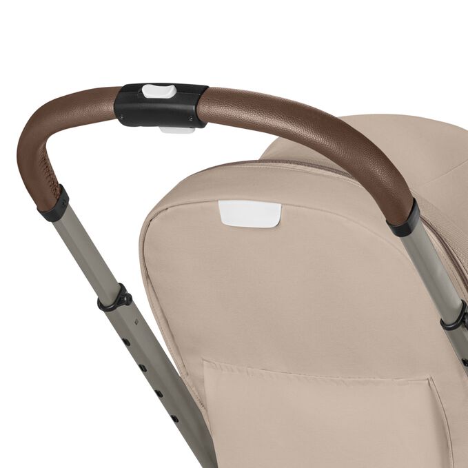 An image of the CYBEX Gold Balios S Lux Stroller, highlighting the One-Hand Height-Adjustable Handlebar feature.