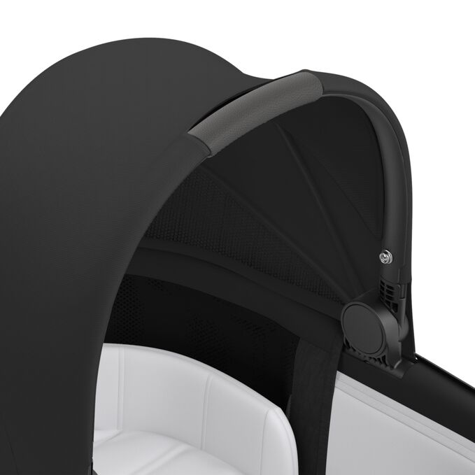 An image of the CYBEX Platinum Mios Lux Carry Cot Stroller, highlighting the Carrying Handle feature.
