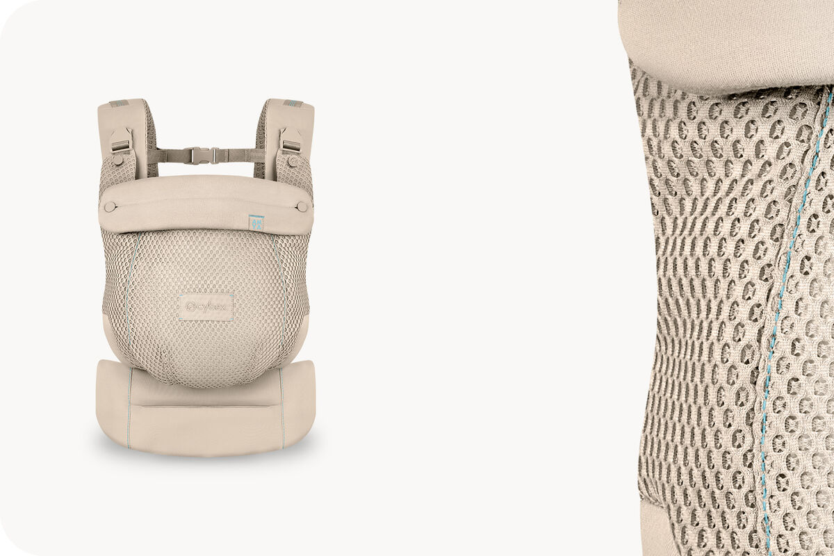 Two product images of an Amya baby carrier in Almond Beige.