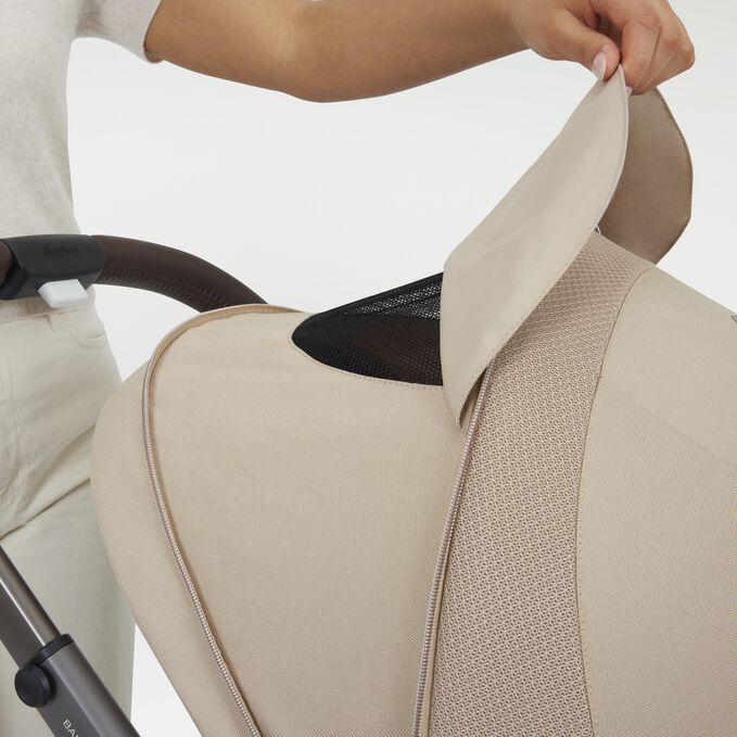 An image of the CYBEX Gold Balios S Lux Stroller, highlighting the XXL Sun Canopy with Mesh Insert feature.