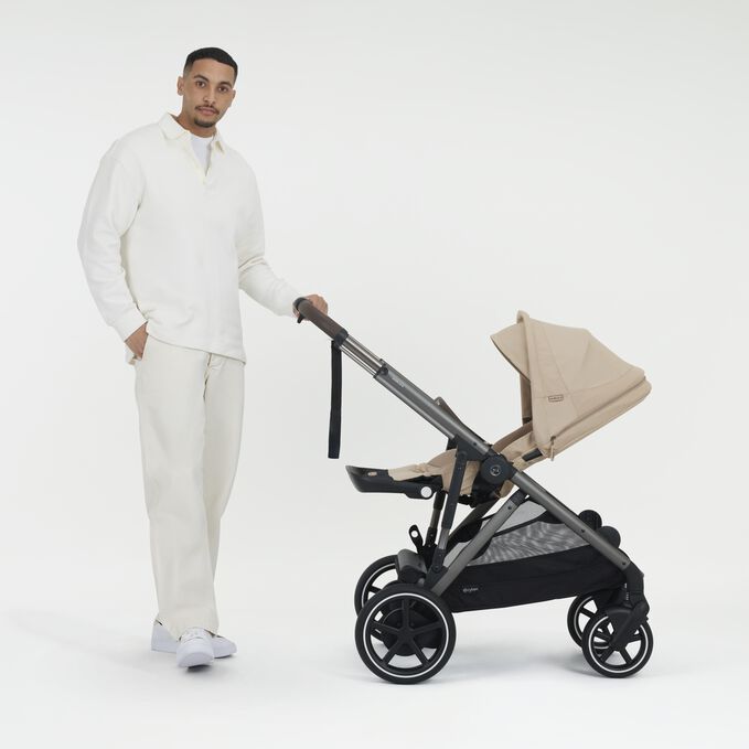 An image of the CYBEX Gold e-Gazelle S Sibling Stroller, highlighting the Ergonomic Near-flat Position feature.