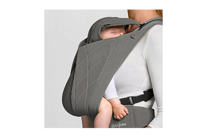 An image of the CYBEX Platinum YEMA.click Baby Carrier, highlighting the Multi-functional head and neck support feature.