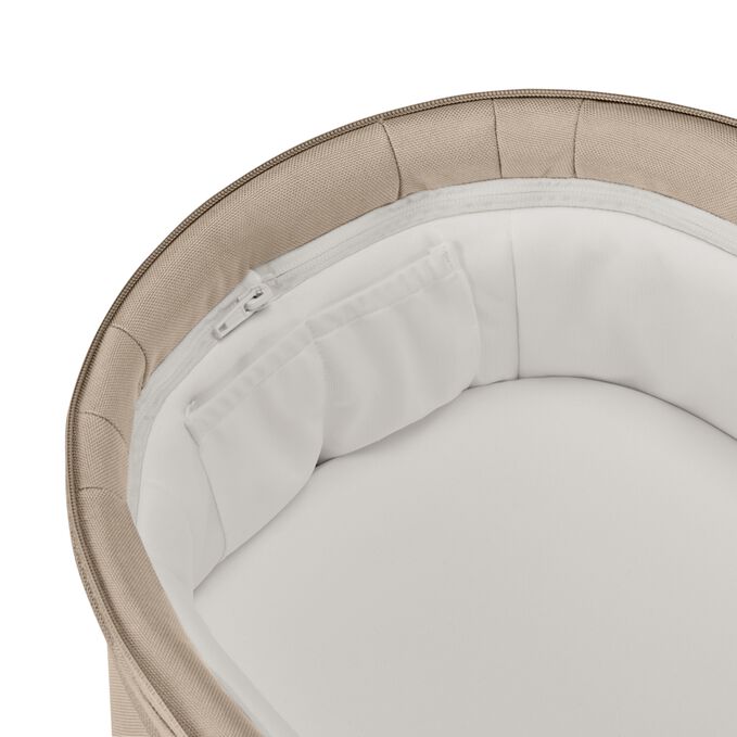 An image of the CYBEX Gold Balios S Lux with Balios Cot S Lux Stroller, highlighting the Inner Cot Pockets feature.