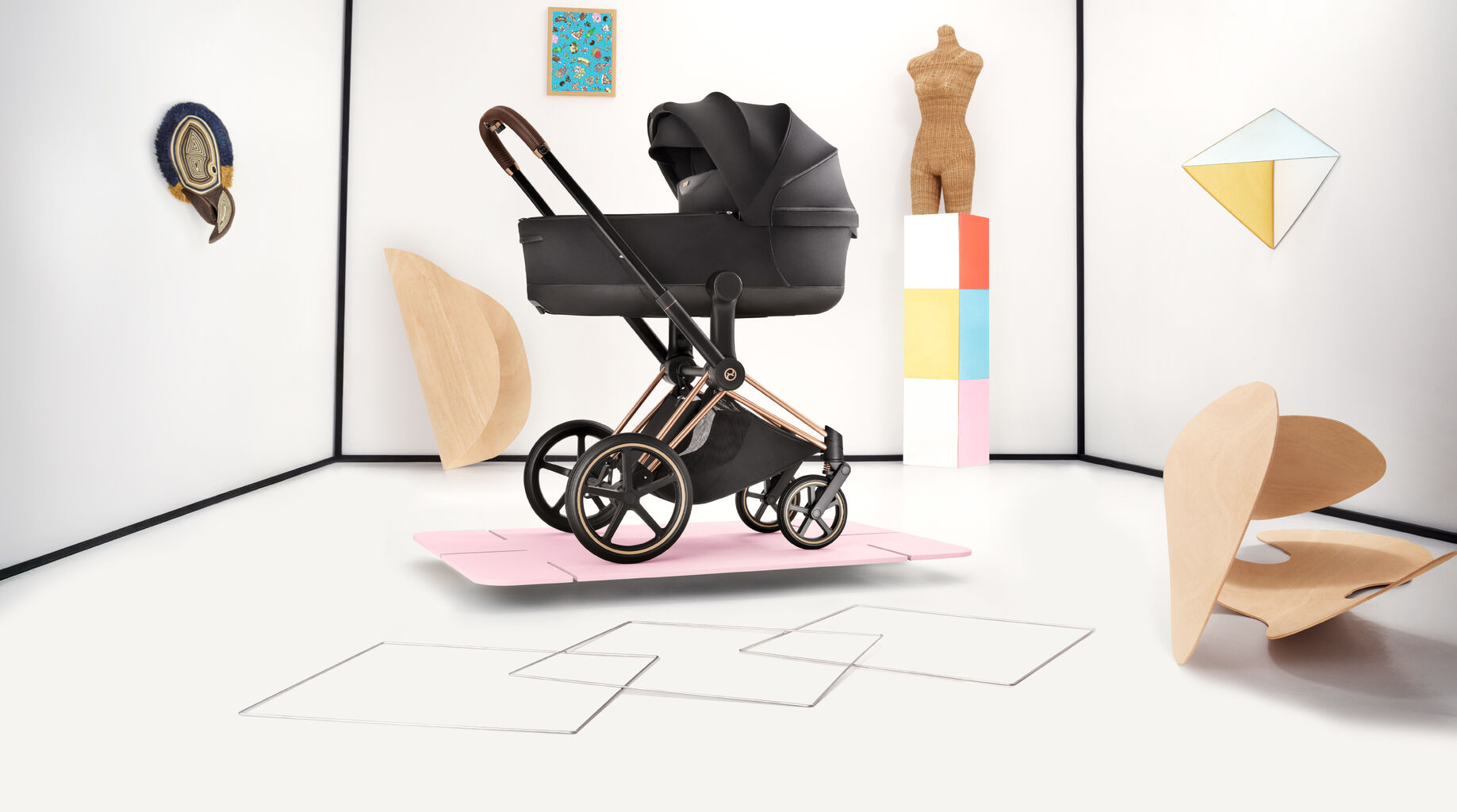 CYBEX Platinum stroller Priam with a foldable Lux Carry Cot attached.
