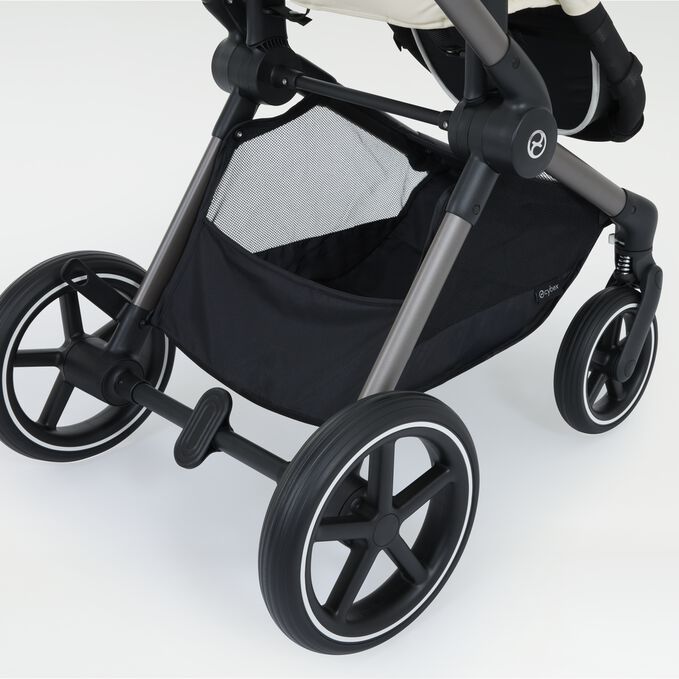 An image of the CYBEX Gold Eos Lux Stroller, highlighting the Spacious Shopping Basket feature.