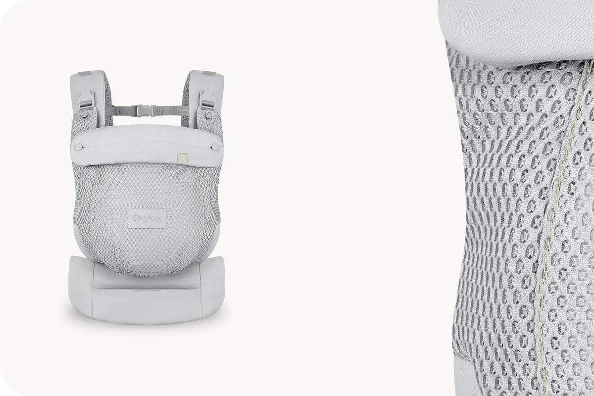 Two product images of an Amya baby carrier in Fog Grey.