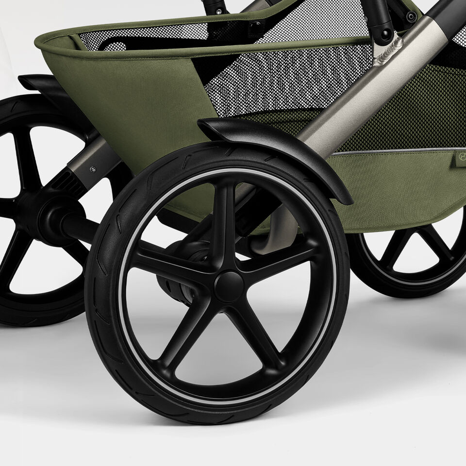 Close-up of the rear wheels and basket of the Talos S Lux.