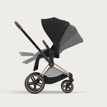 An image of the CYBEX Platinum Priam Seat Pack 2023 Stroller, highlighting the One-hand recline and fold feature.