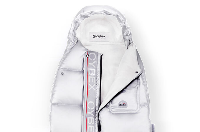 An image of the CYBEX Platinum Platinum Winter Footmuff Mini Accessories for Strollers, highlighting the Adjustable Opening feature.
