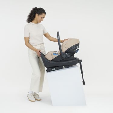 An image of the CYBEX Gold Cloud G Pro with Load Leg Base Infant Car Seat, highlighting the Reduces crash forces by up to 30%* feature.