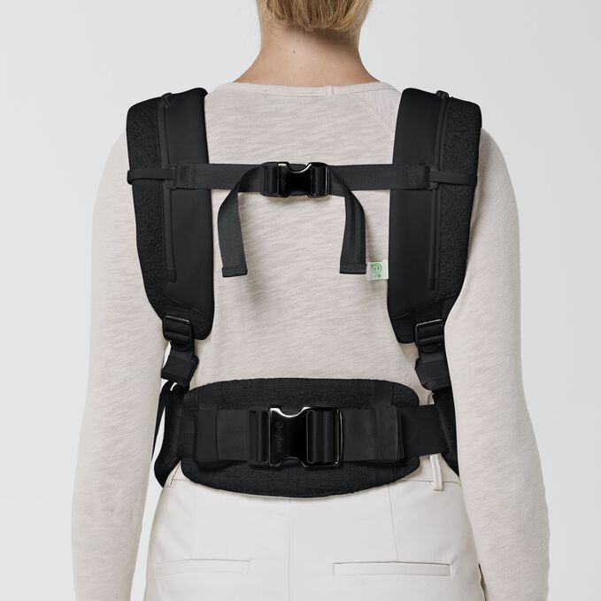 An image of the CYBEX Platinum Coya Carrier Bouclé Baby Carrier, highlighting the Specially Padded Fabric feature.
