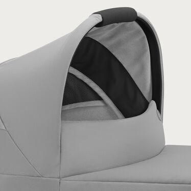 An image of the CYBEX Gold Cot S Stroller, highlighting the Carrying Handle feature.