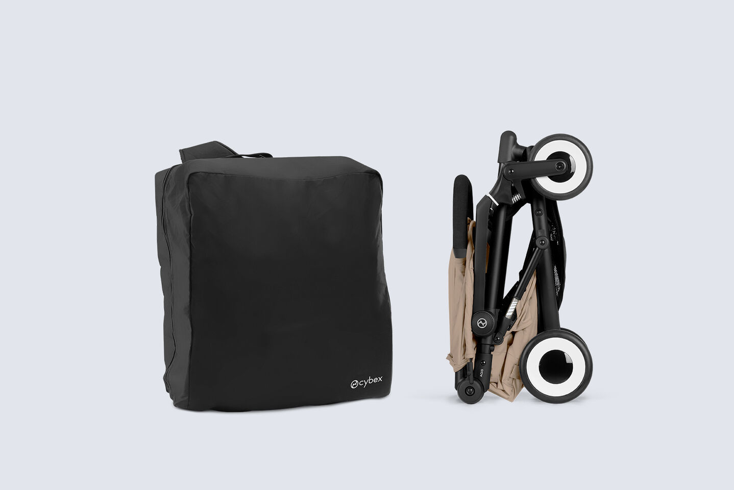 A folded up Agis on the right with a travel bag on the left