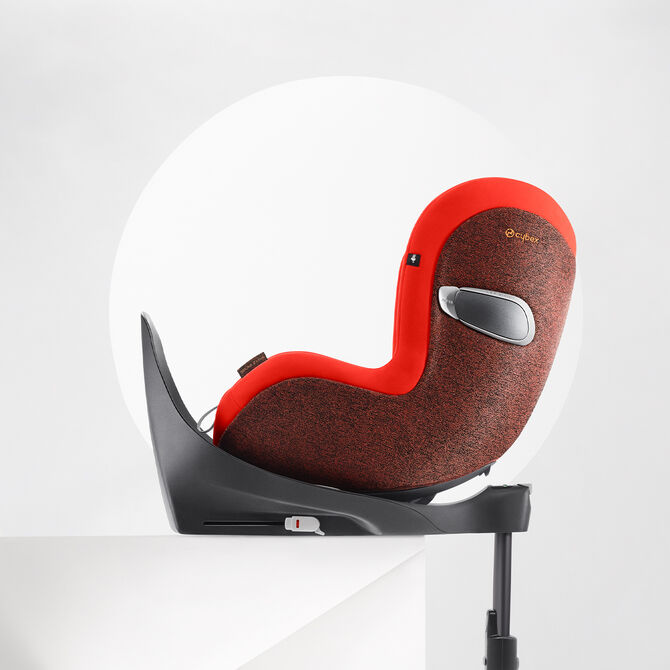 Sirona Z child car seat in red and brown on a white background.