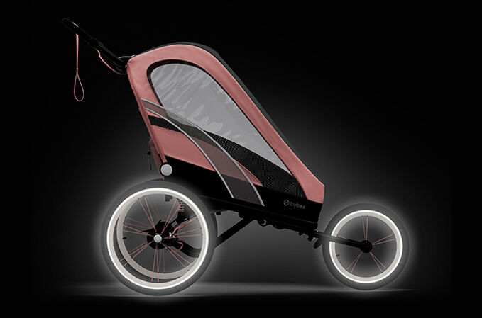 An image of the CYBEX Gold Zeno Seat Pack Cross Country Ski Trailer, highlighting the Reflective details feature.