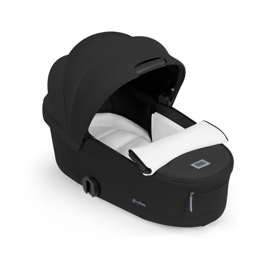 CYBEX Mios/Coya Fold Lux Carry Cot multi-zip apron and inner pocket feature.