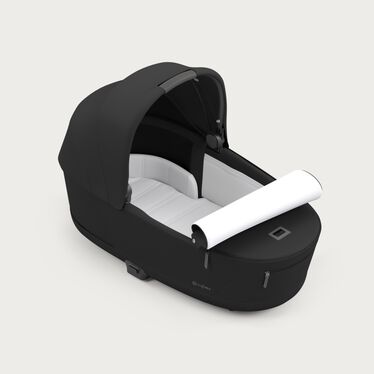An image of the CYBEX Platinum Priam Lux Carry Cot Stroller, highlighting the Breathable Soft Foam Mattress feature.