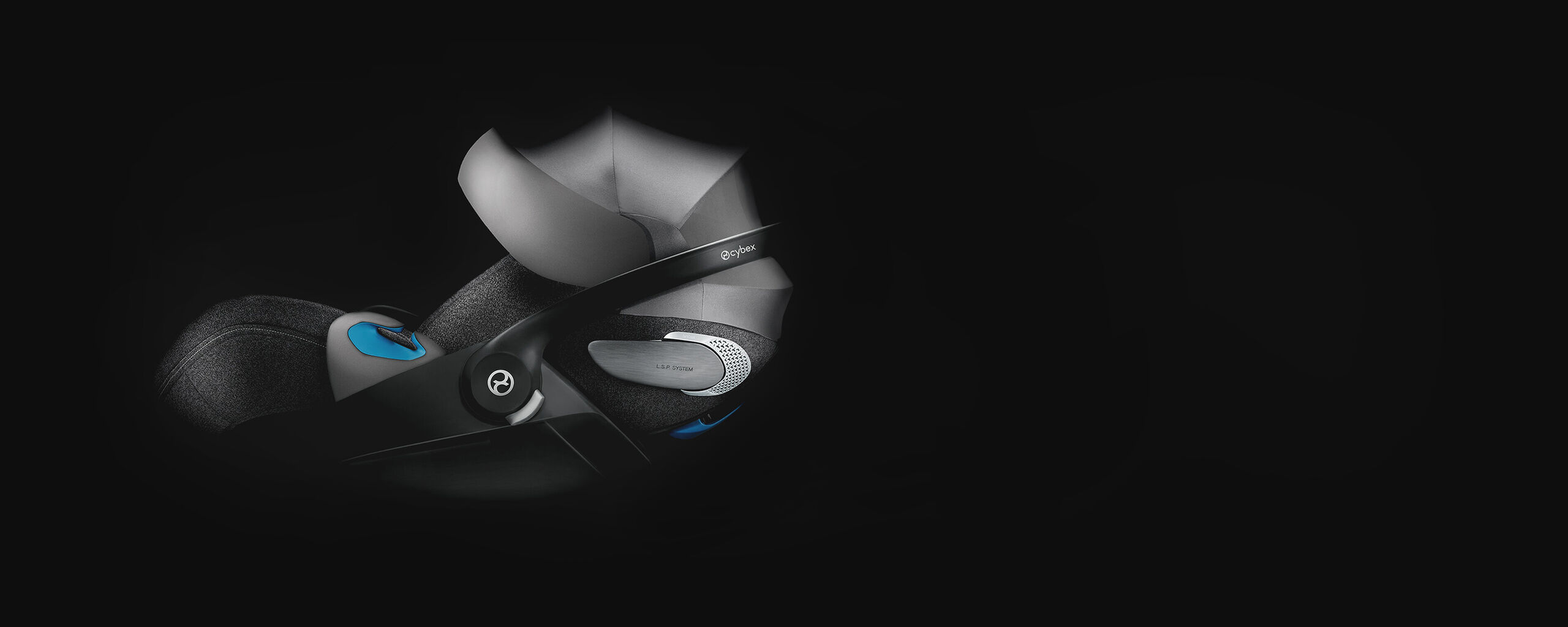 Cybex car seat with L.S.P. system, on a black background, showcasing the innovative headrest and safety features