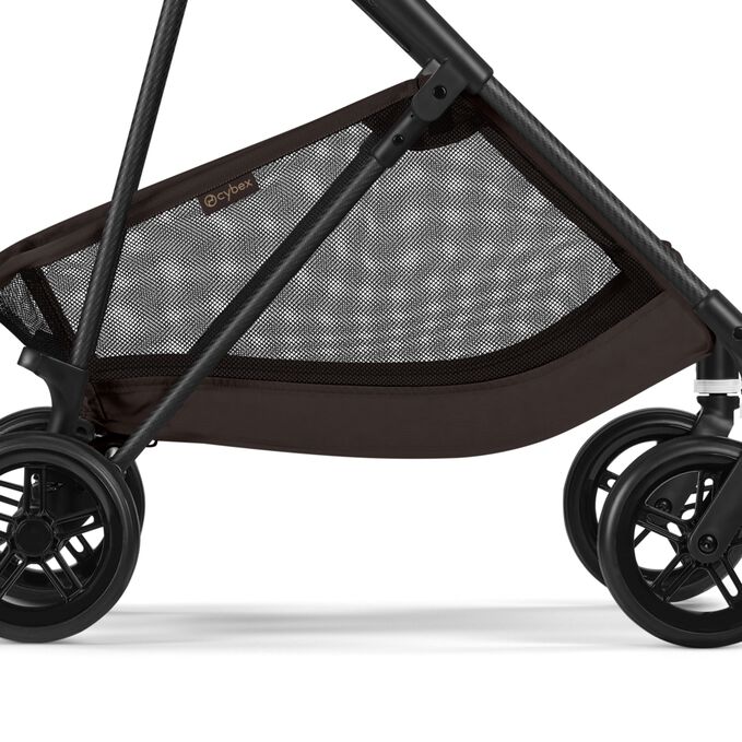 An image of the CYBEX Gold Melio Carbon Stroller, highlighting the Spacious Color Coordinated Shopping Basket feature.