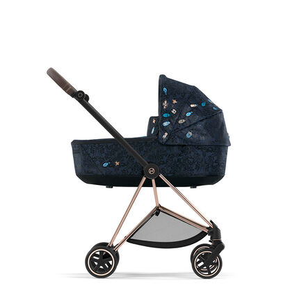 Navicella Mios Lux Carry Cot CYBEX Platinum Jewels of Nature Collection mostrata su telaio Mios