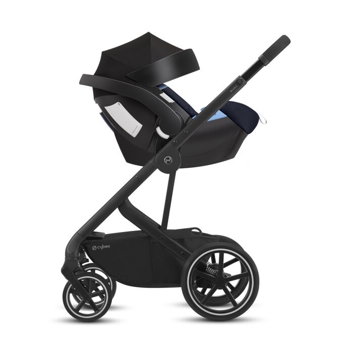 Immagine del CYBEX Gold Aton 5 Infant Car Seat che mette in risalto la caratteristica Sistema da viaggio CYBEX.