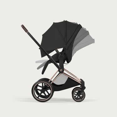 An image of the CYBEX Platinum Priam/e-Priam Seat Pack - Style Collection Stroller, highlighting the Ergonomic Near-Flat with XXL Extendable Canopy feature.