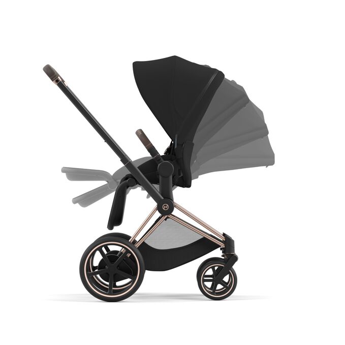 An image of the CYBEX Platinum e-Priam Jeremy Scott - Wings Stroller, highlighting the One-hand recline and fold feature.