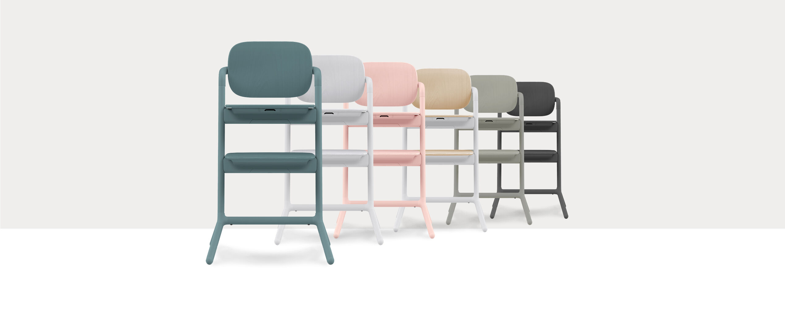 A row of six modern high chairs in various colours, including blue, white, pink, beige, grey, and black, on a white background.