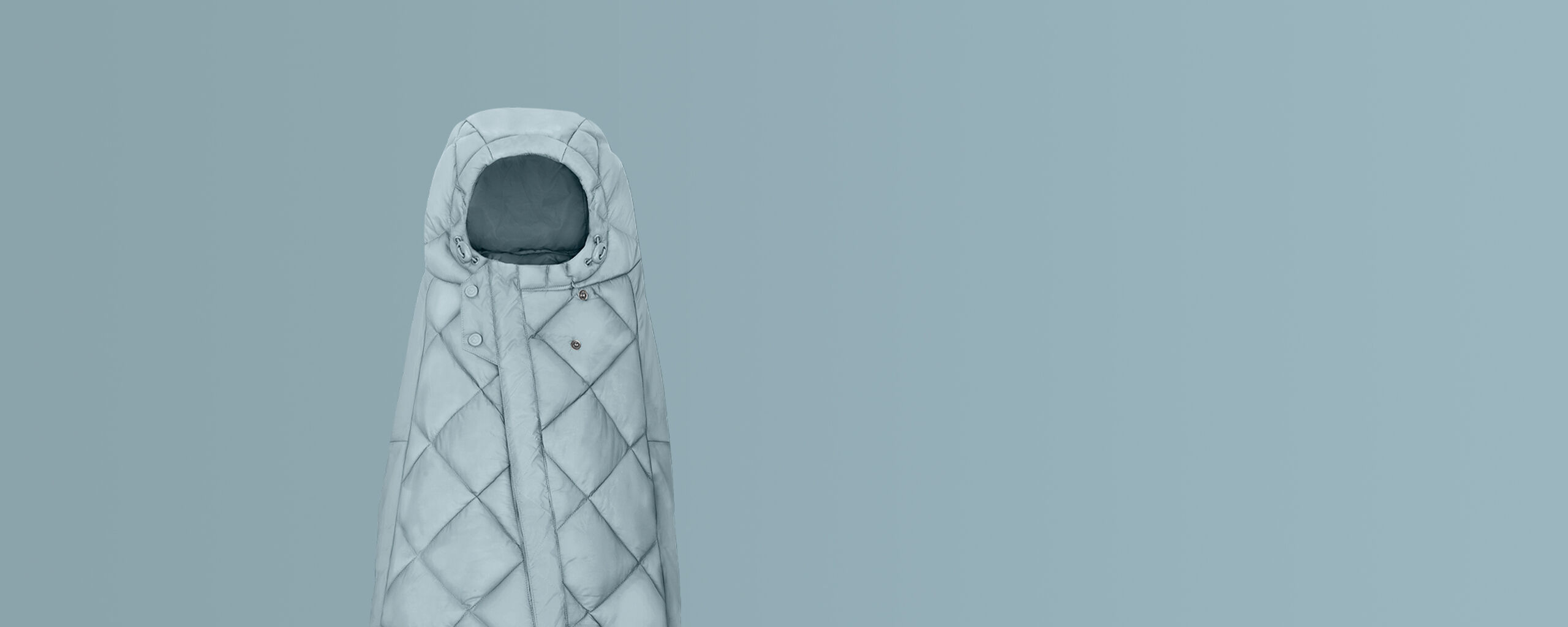 Snogga footmuff in light blue with quilted design.