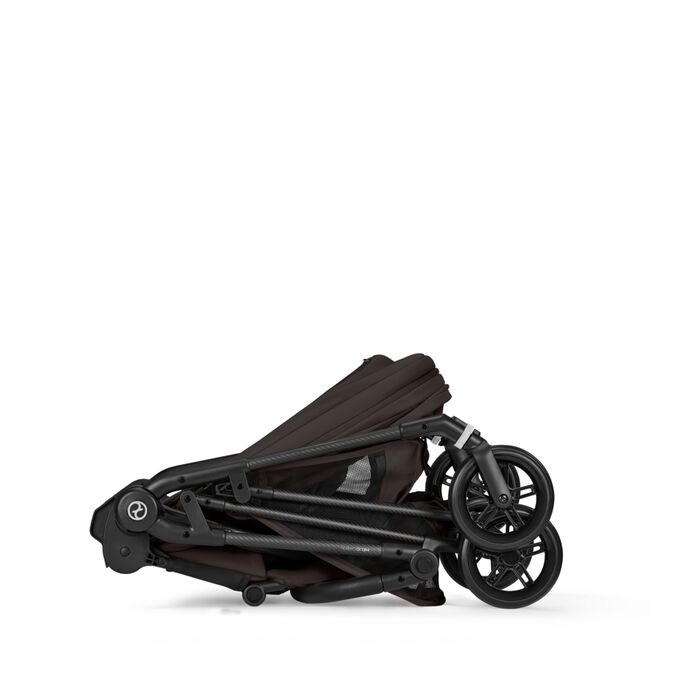 An image of the CYBEX Gold Melio Carbon Stroller, highlighting the Compact Fold feature.