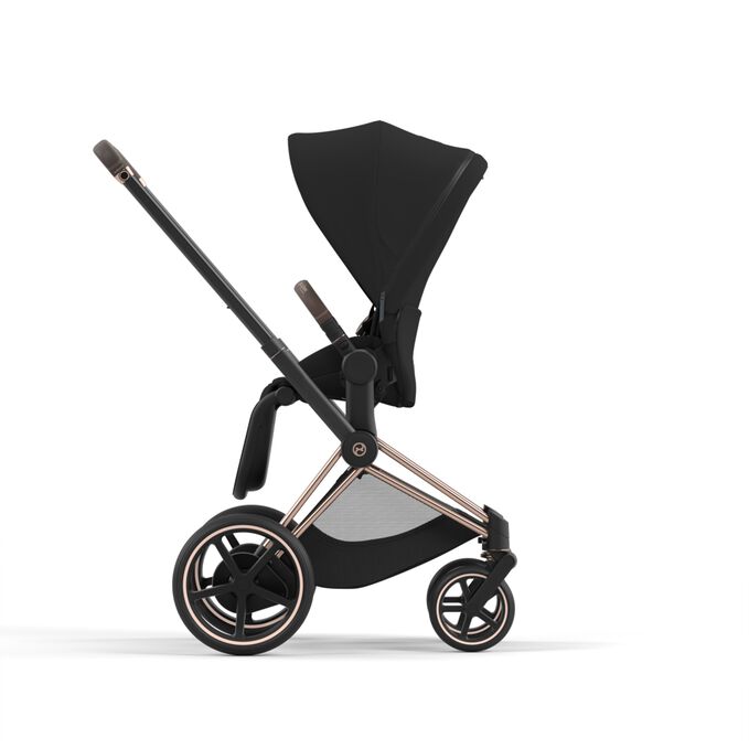 An image of the CYBEX Platinum e-Priam Jeremy Scott - Wings Stroller, highlighting the Reversible seat unit feature.