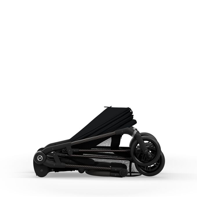 An image of the CYBEX Gold Melio Carbon Stroller, highlighting the Compact Fold feature.